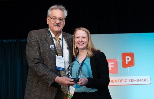 Recipient of an Award Smiling