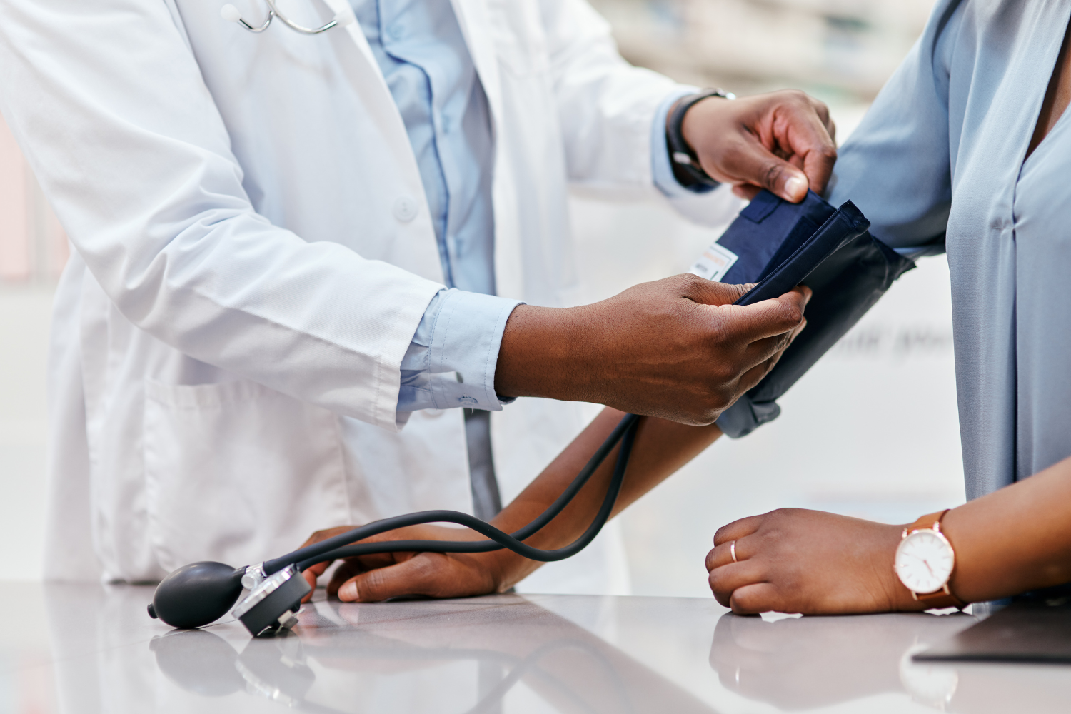 DPC 1500 x 1000 doctor takes blood pressure of patient