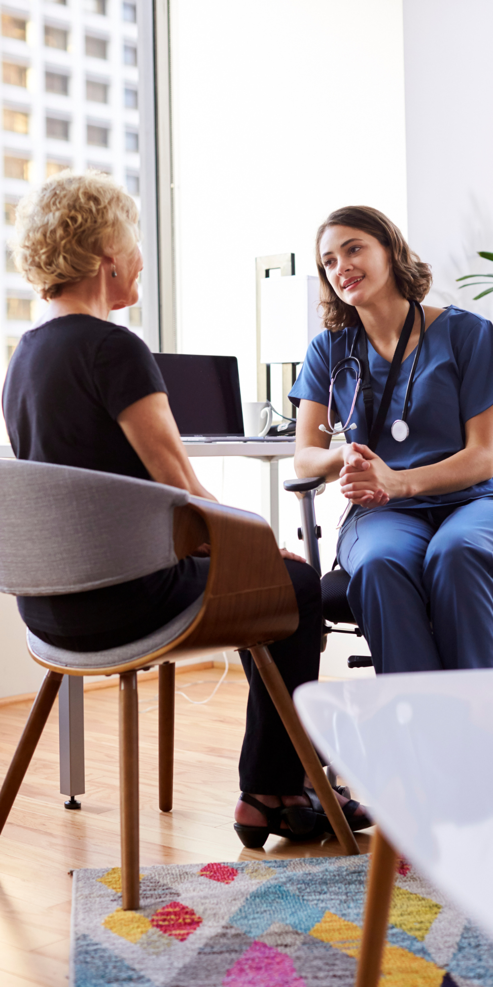 Resident consulting with patient - 1000 x 2000 Doctor consulting with patient