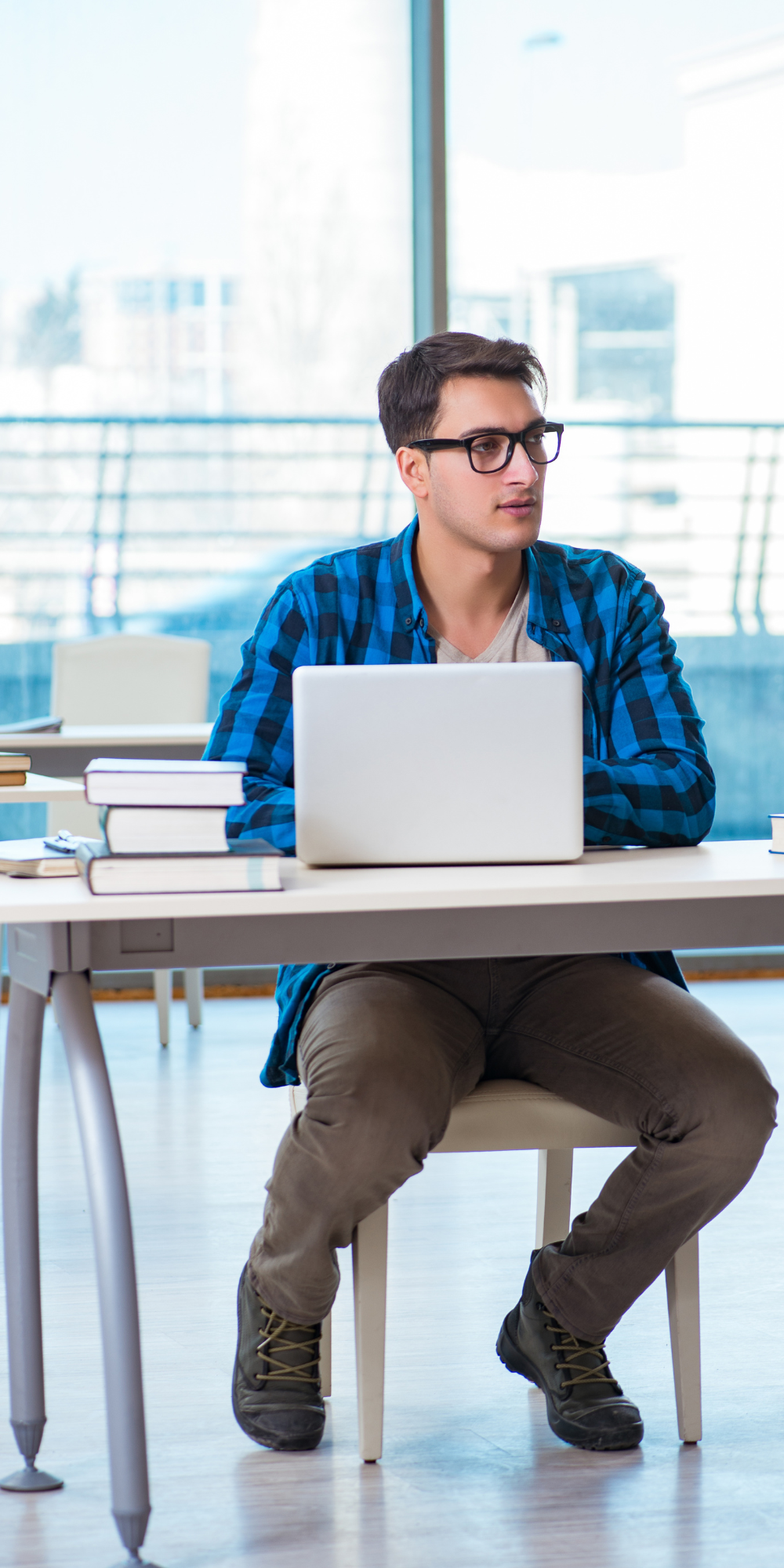 Man studying - 1000 x 2000 Man working on computer