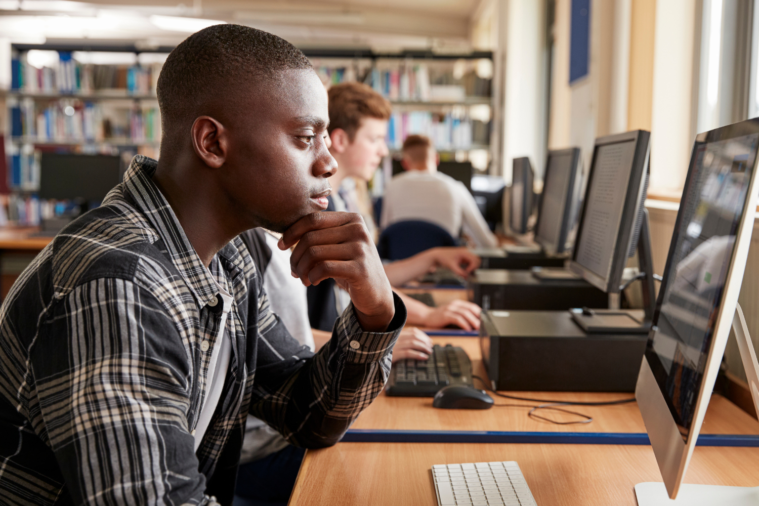Student on computer - 1500 x 1000 Man on computer